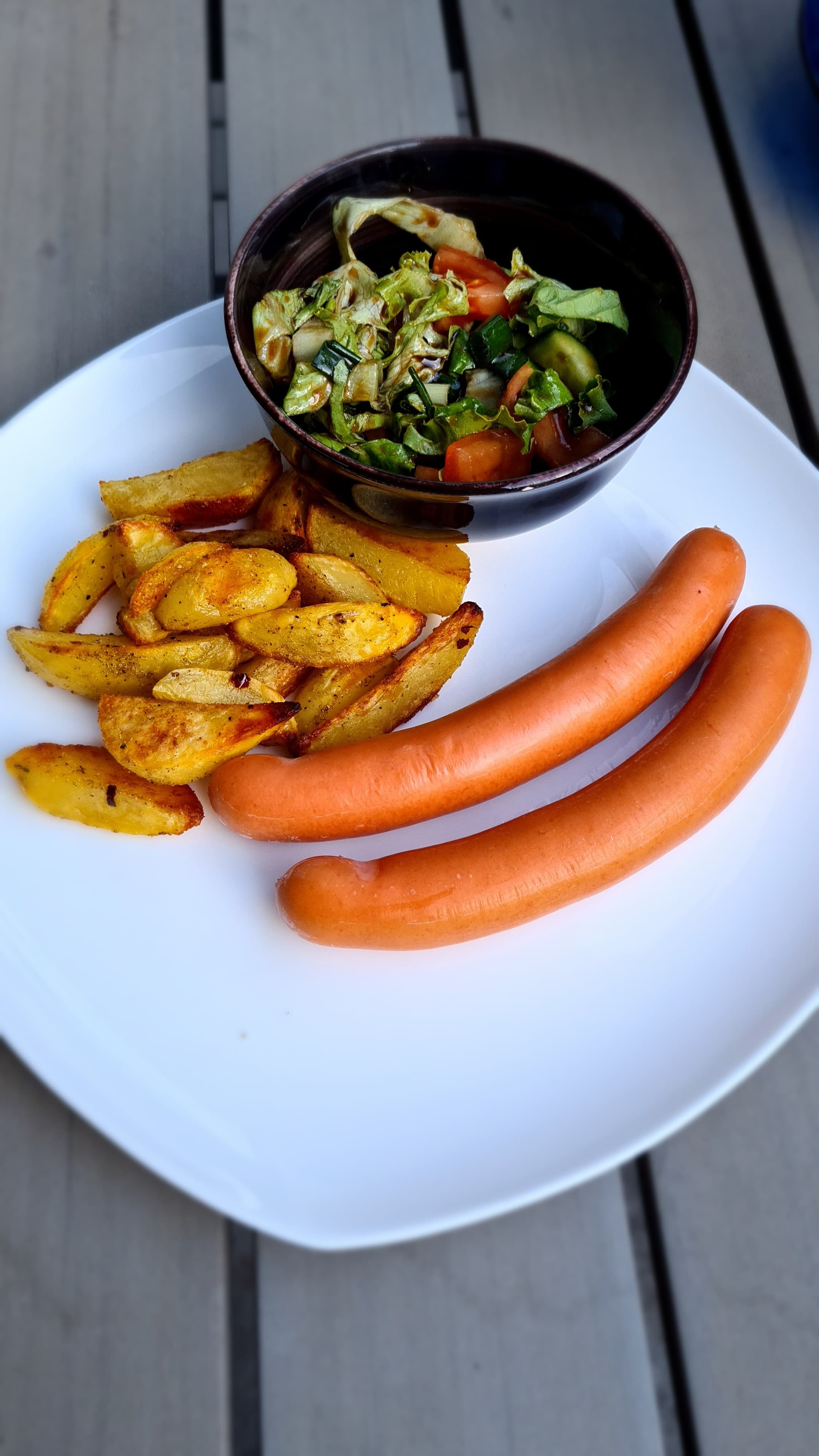 Sausages with Baked Potatoes and Fresh Salad Recipe Image